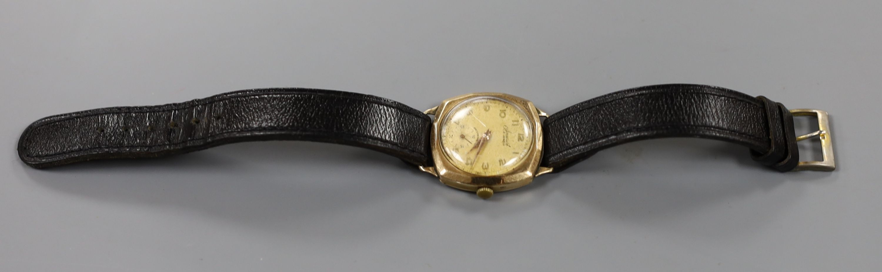 A gentleman's 1950's 9ct gold Accurist manual wind wrist watch, on associated leather strap, gross weight 29.7 grams.